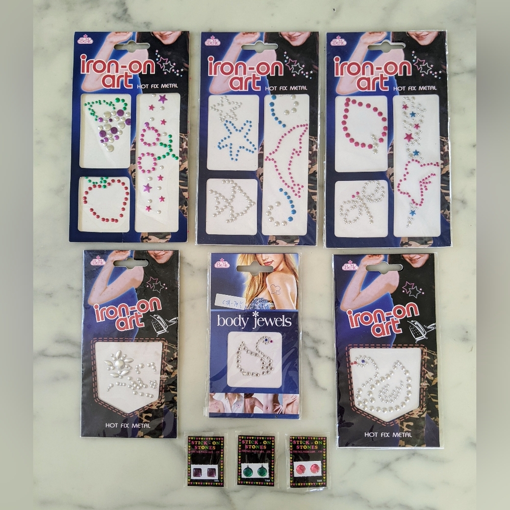NWT. 5 Packs Of Multicolor Iron-On Art For Clothes and 4 Packs Of Body Jewels.